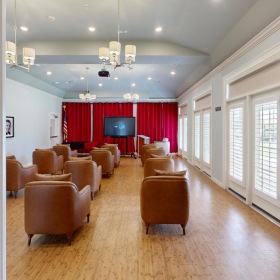 The essence of exceptional living a room with chairs and a tv